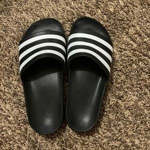 Black Adidas slides